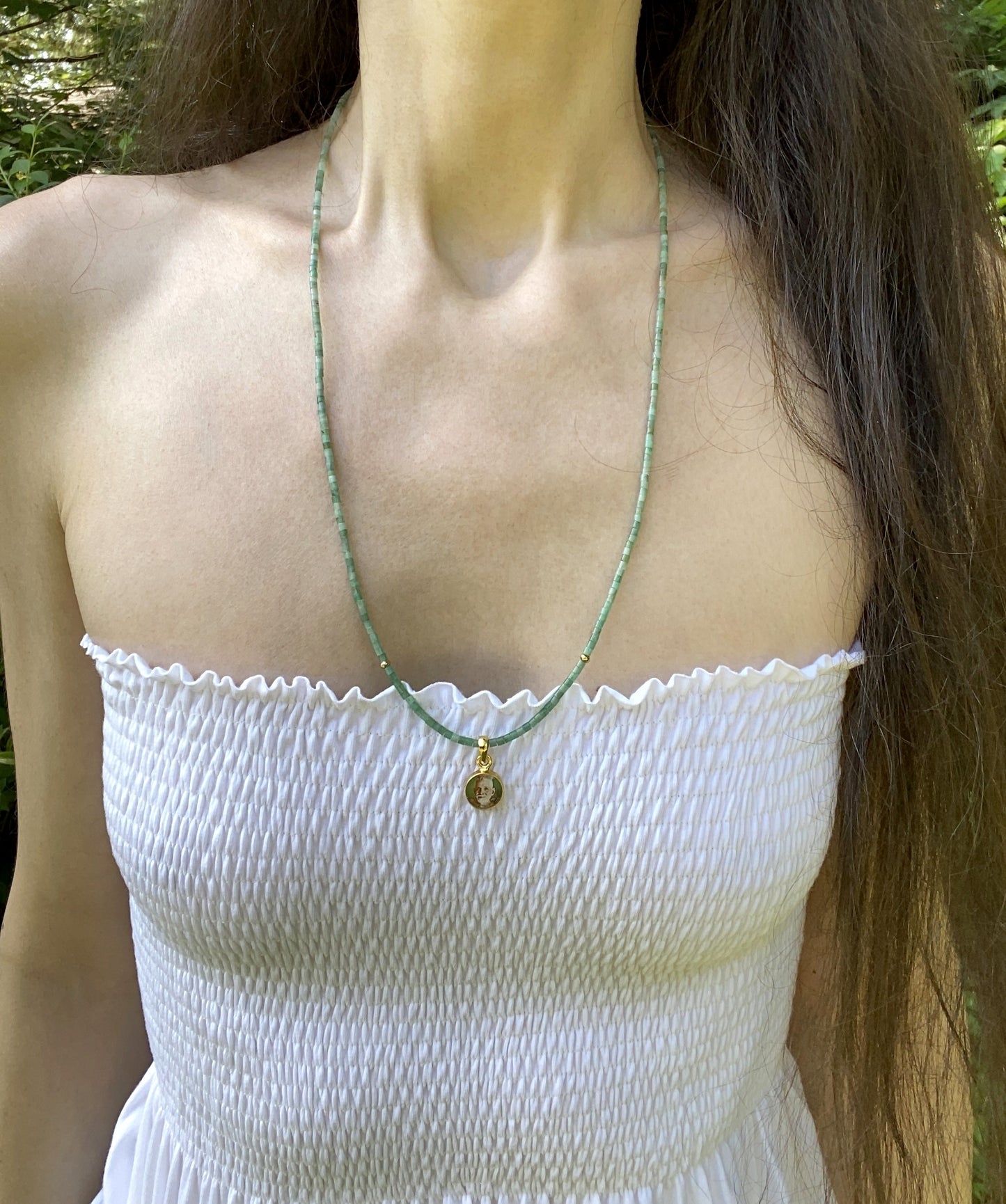 RAMANA MAHARSHI PENDANT NECKLACE IN EMERALD