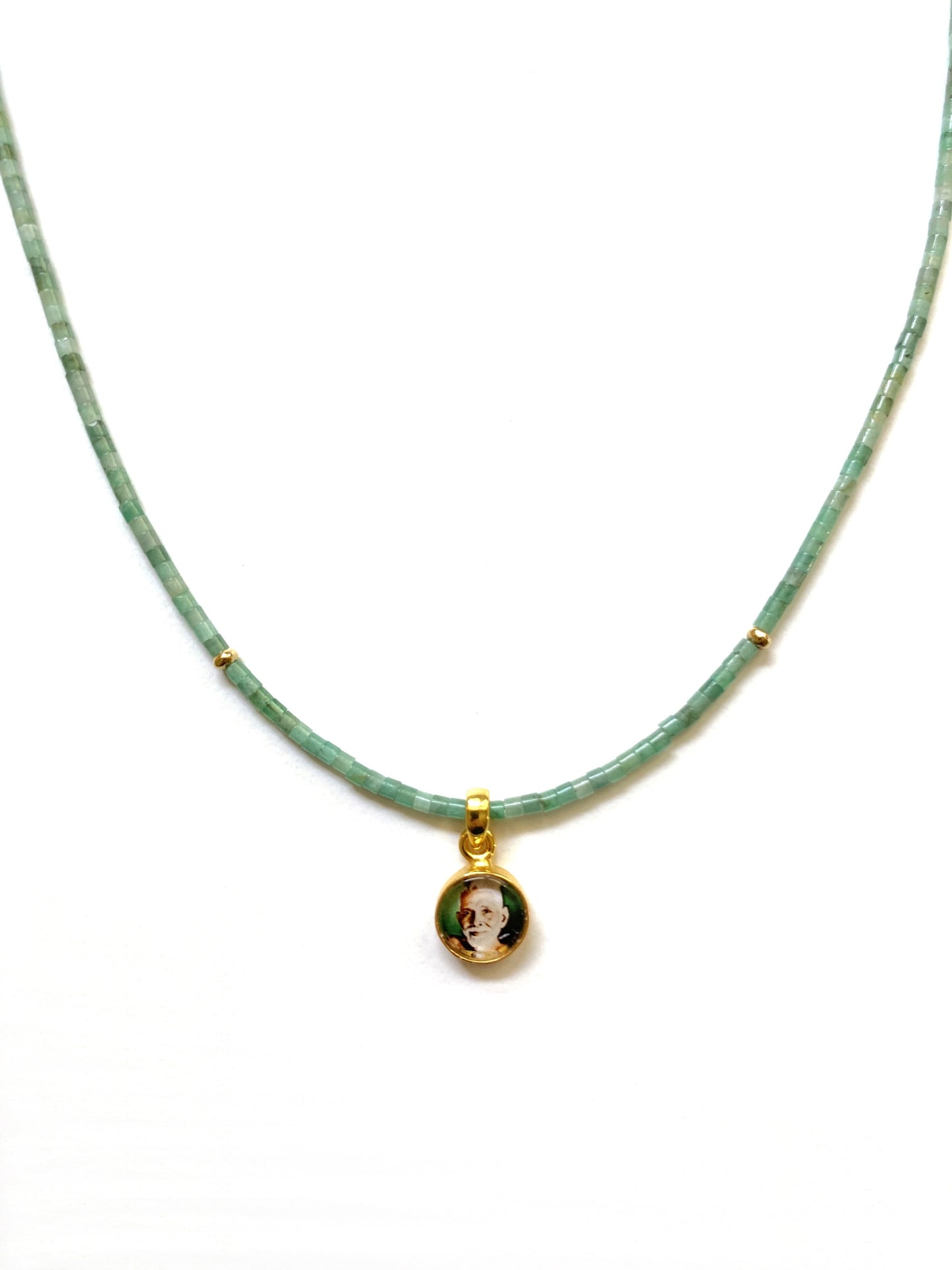 RAMANA MAHARSHI PENDANT NECKLACE IN EMERALD