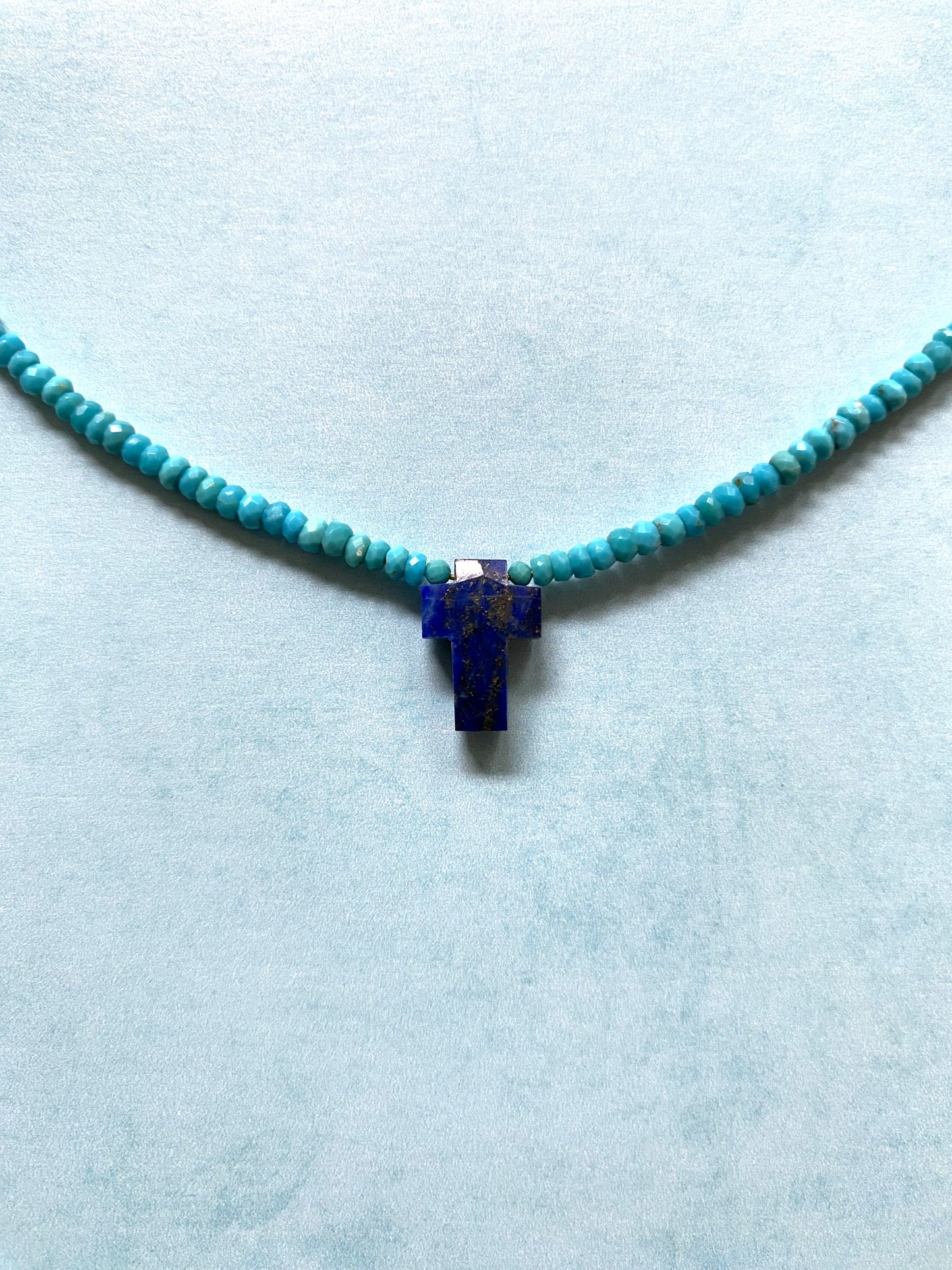 INNER STRENGTH CROSS NECKLACE IN TURQUOISE AND LAPIS