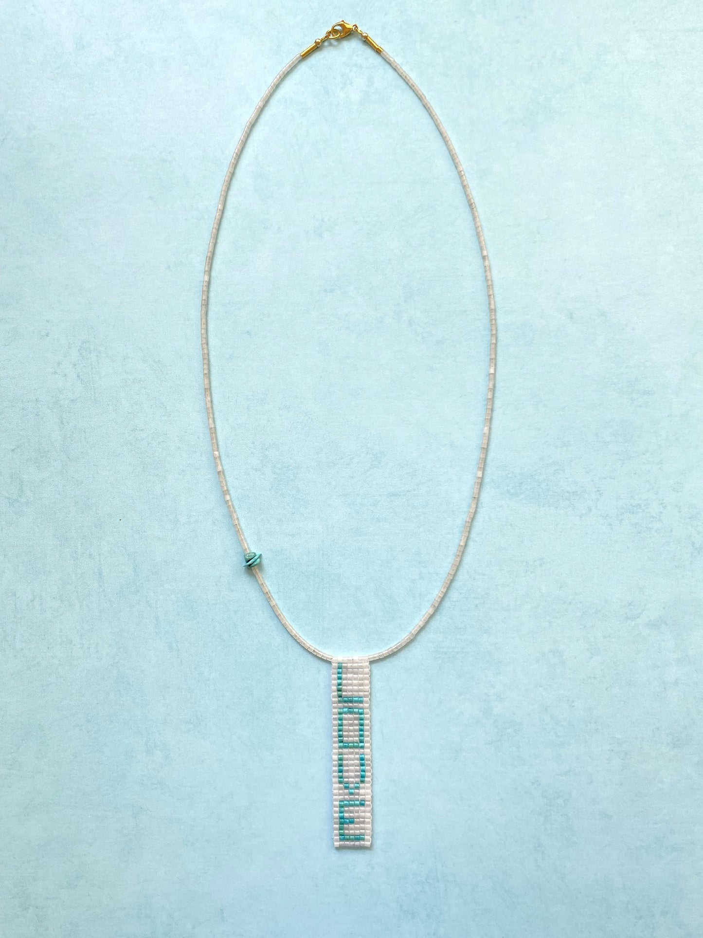 LET LOVE RULE NECKLACE IN WHITE JADE