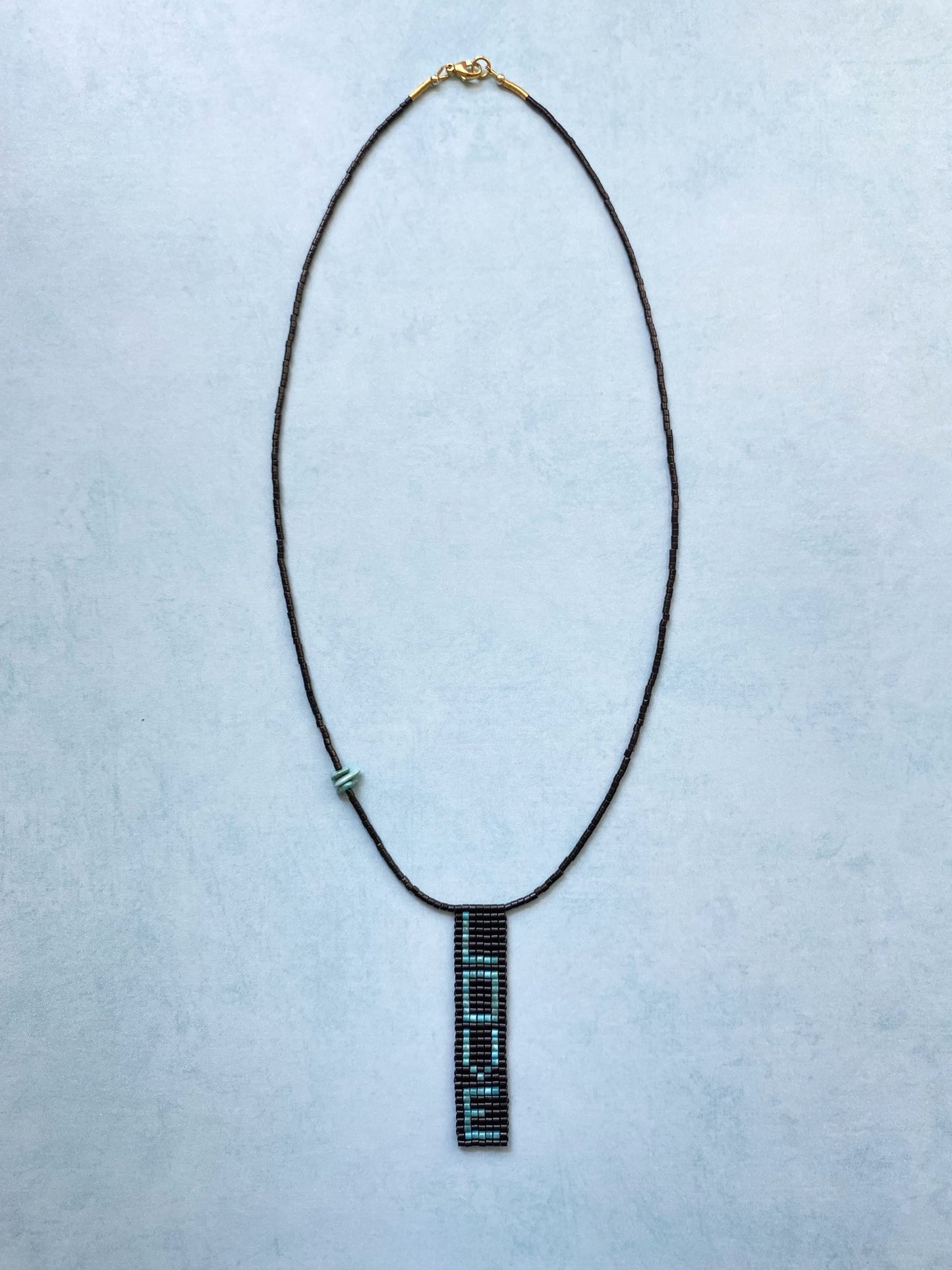 LET LOVE RULE NECKLACE IN BLACK TOURMALINE
