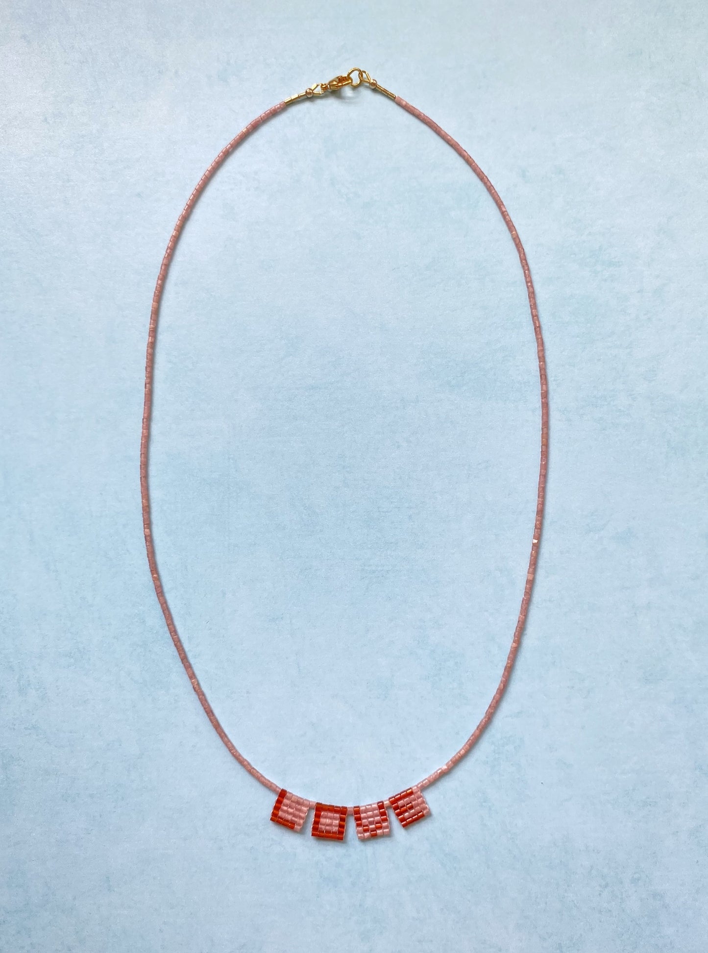 LOVE LETTERS NECKLACE IN PINK RHODOCHROSITE