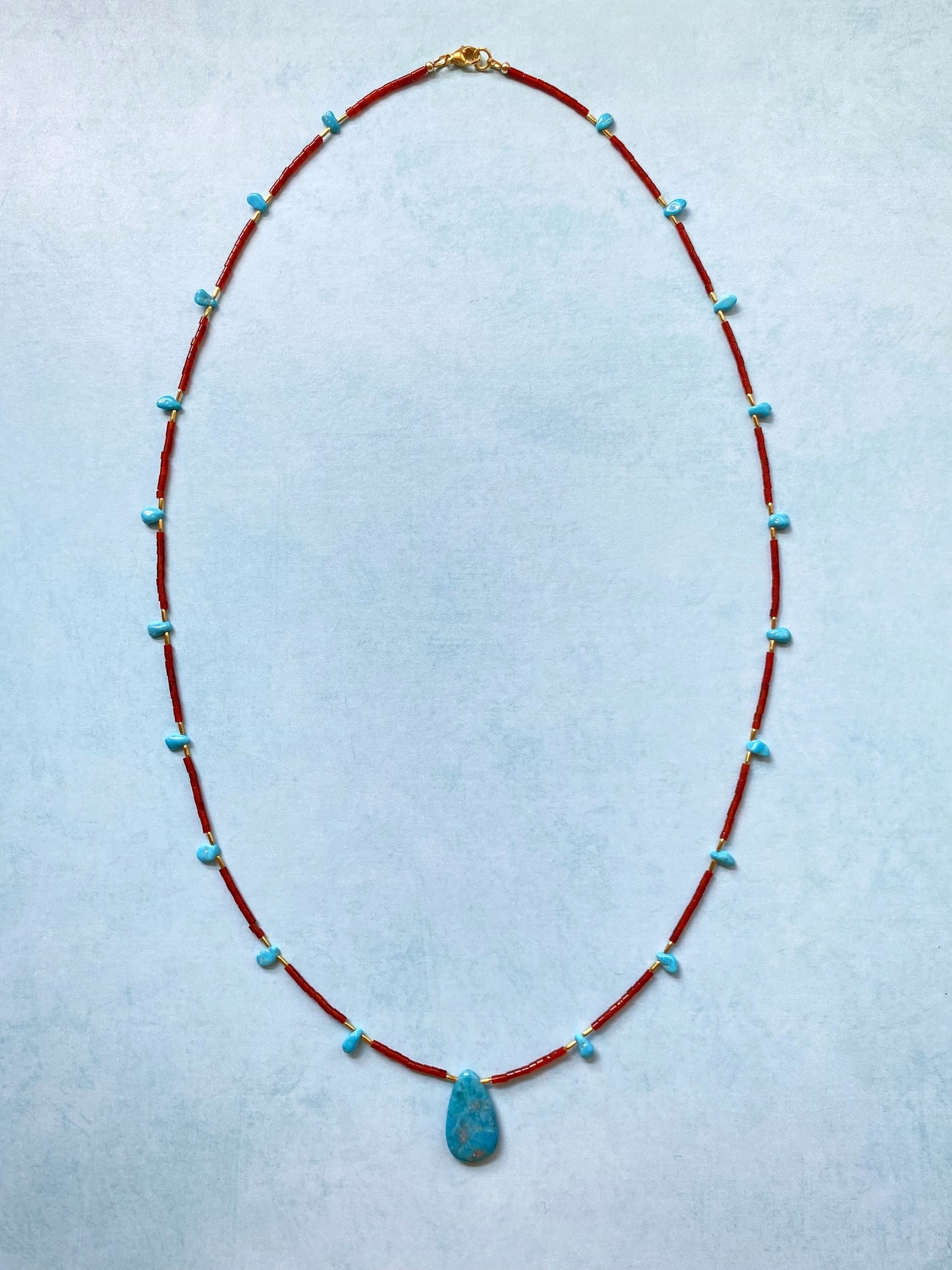 TURQUOISE BLOOM NECKLACE IN RED AGATE AND TURQUOISE